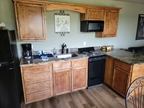 Microwave, stovetop - Turner Falls Cabins #1 in Turner Falls Park (Davis)