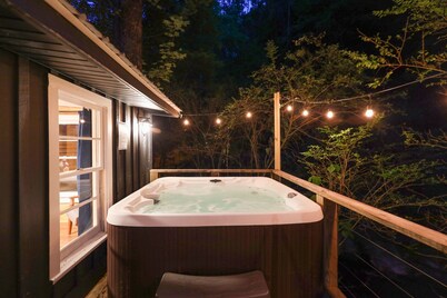Walk-to-Downtown Retreat | Creekside + Hot Tub