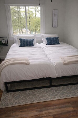 4 bedrooms, iron/ironing board, travel cot, WiFi