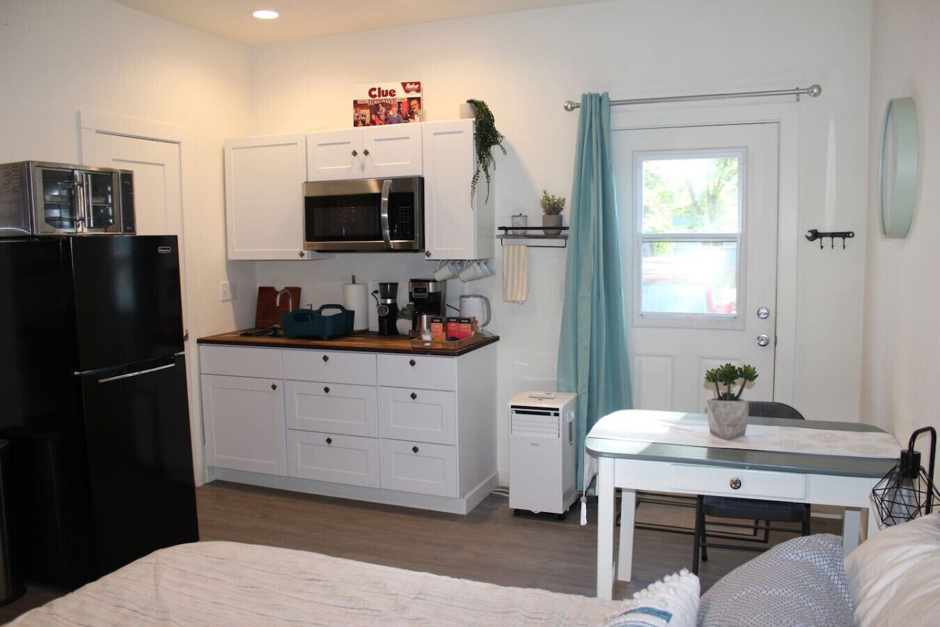 Fridge, coffee/tea maker, cookware/dishes/utensils