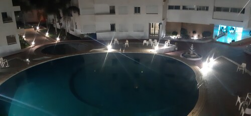 Large apartment in private residence with swimming pools