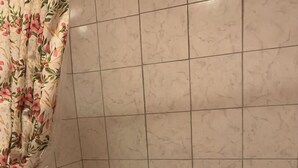 A bathroom with a bathtub, tiled walls, and a toilet. - Nice to meet you (Jackson)