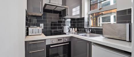 Apartamento, baño privado (One Bedroom) | Cocina privada