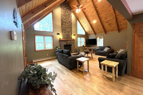 The living room with a wood fireplace.