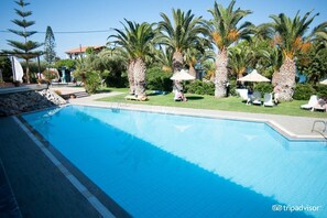 Outdoor pool, a heated pool, pool umbrellas, sun loungers