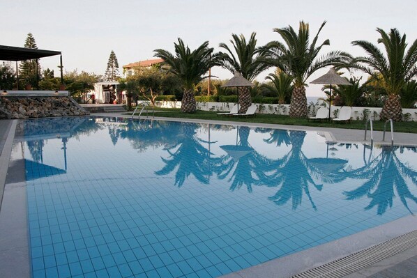 Outdoor pool, a heated pool, pool umbrellas, sun loungers