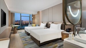 Roba de llit d'alta qualitat, cobrellits i minibar 