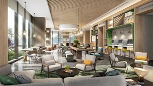 A modern lobby with a bar area, seating arrangements, and a view of the outdoors. - Holiday Inn Changsha Malanshan by IHG (Changsha)