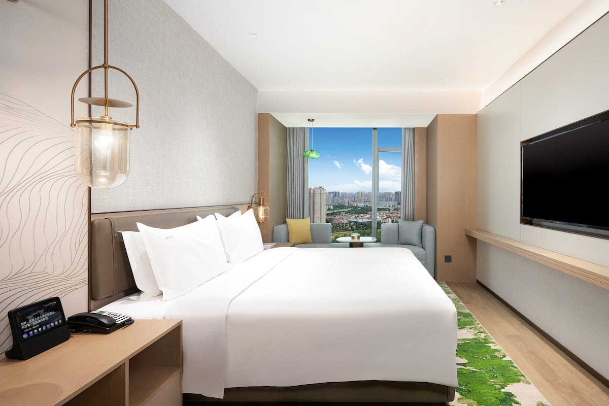 Suite, 1 King Bed (Living Area) | Premium bedding, down comforters, minibar, in-room safe