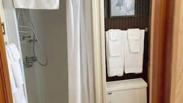 Shower, towels, soap, toilet paper
