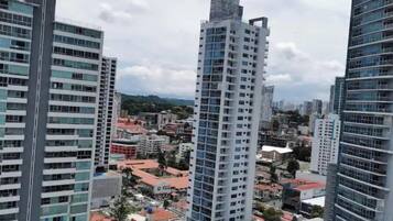 A high-rise building with multiple floors and a modern architectural design.