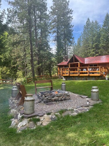 Beautiful cabin with a creek running through it.