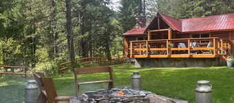 Beautiful cabin with a creek running through it.