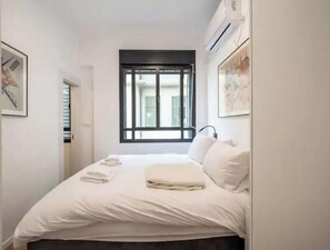 2 slaapkamers, een strijkplank/strijkijzer, gratis wifi