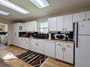 Fridge, microwave, oven, stovetop - Large, Comfortable Home | Sleeps 8 | On the Clearwater River | Dog Friendly (Seeley Lake)