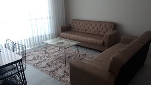 Televisión LCD 82 cm con canales de televisión vía satélite, televisión