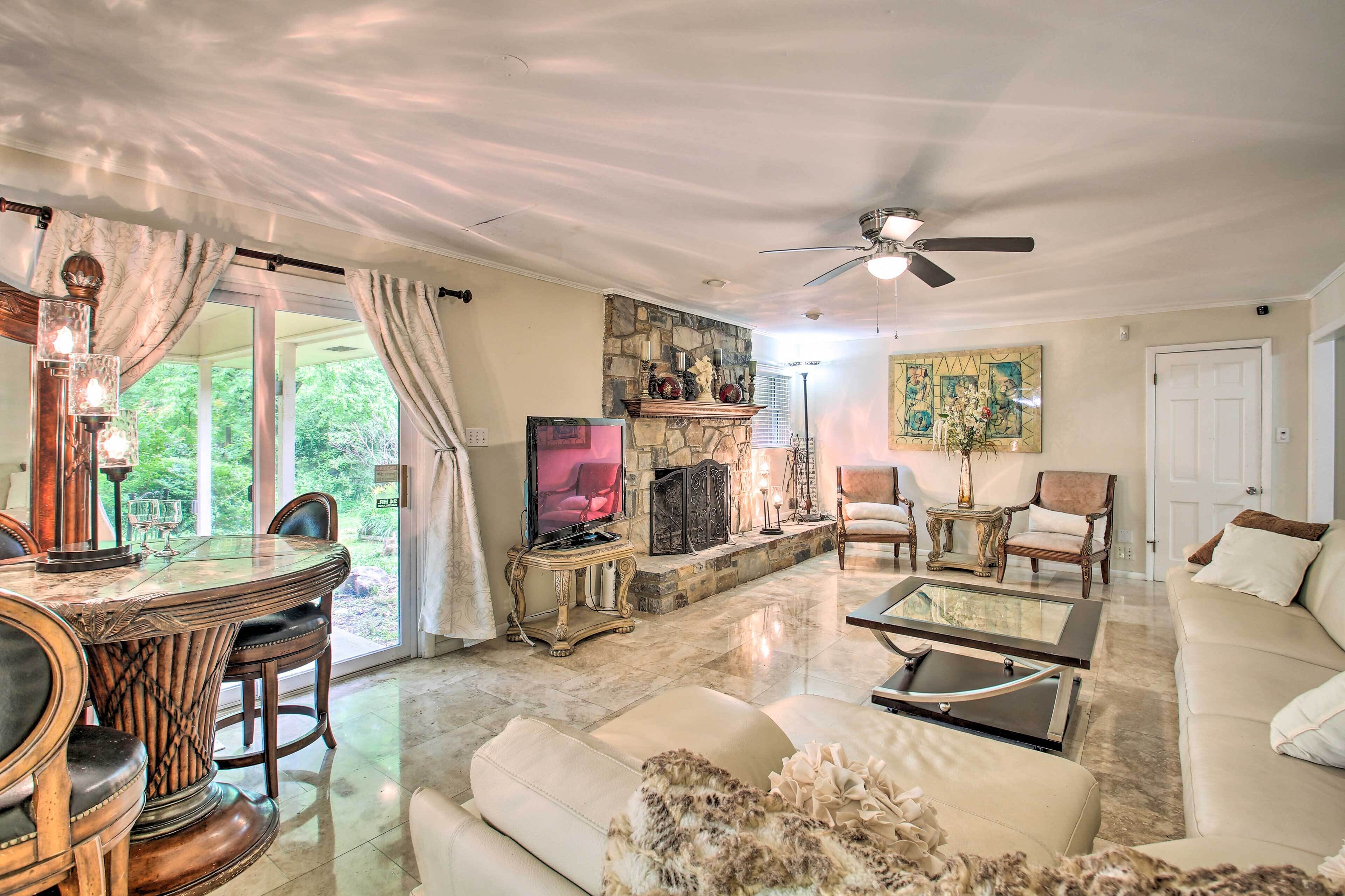 TV, fireplace, books, printers