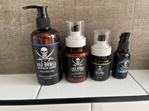 Bathtub, hair dryer, towels, soap