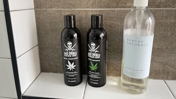 Bathtub, hair dryer, towels, soap