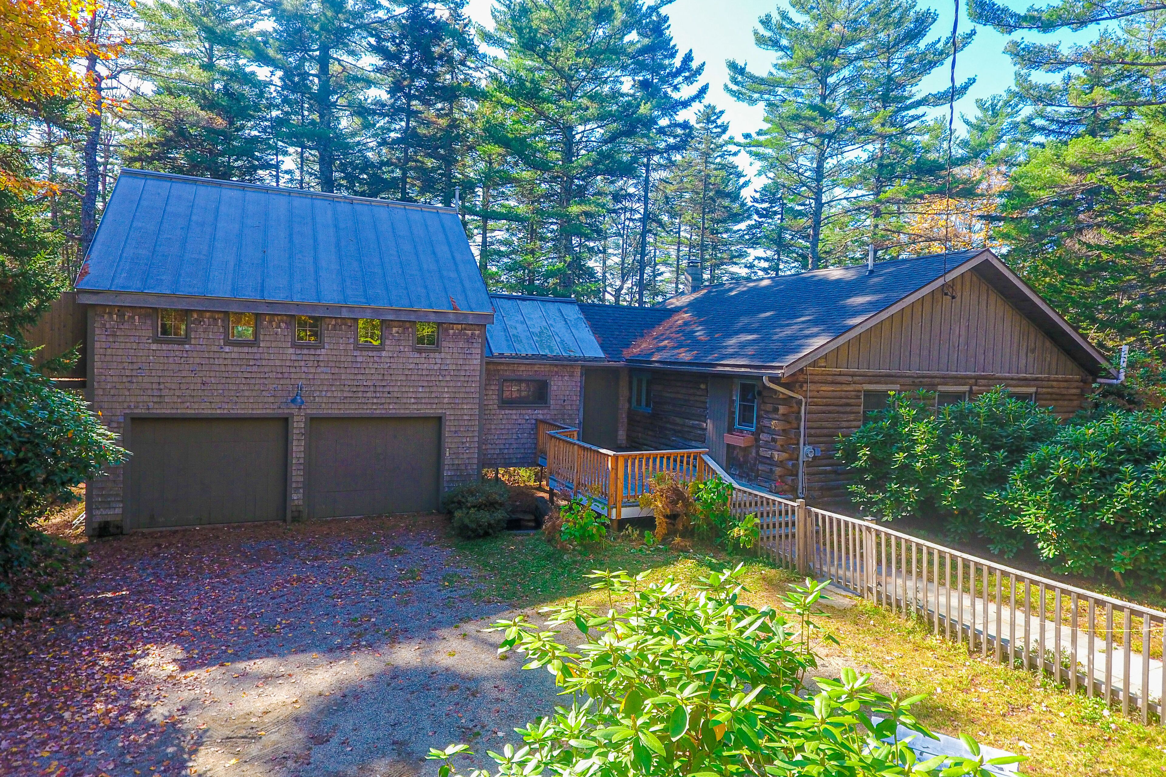 Fantastic property on the pond with firepit, wraparound deck, & kayaks
