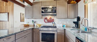 Dog-friendly ocean-view home with gas grill, deck, gas fireplace, washer/dryer