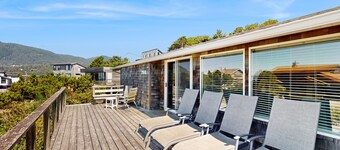 Dog-friendly ocean-view home with gas grill, deck, gas fireplace, washer/dryer