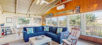 Dog-friendly home with electric fireplace, enclosed yard, deck, beach access