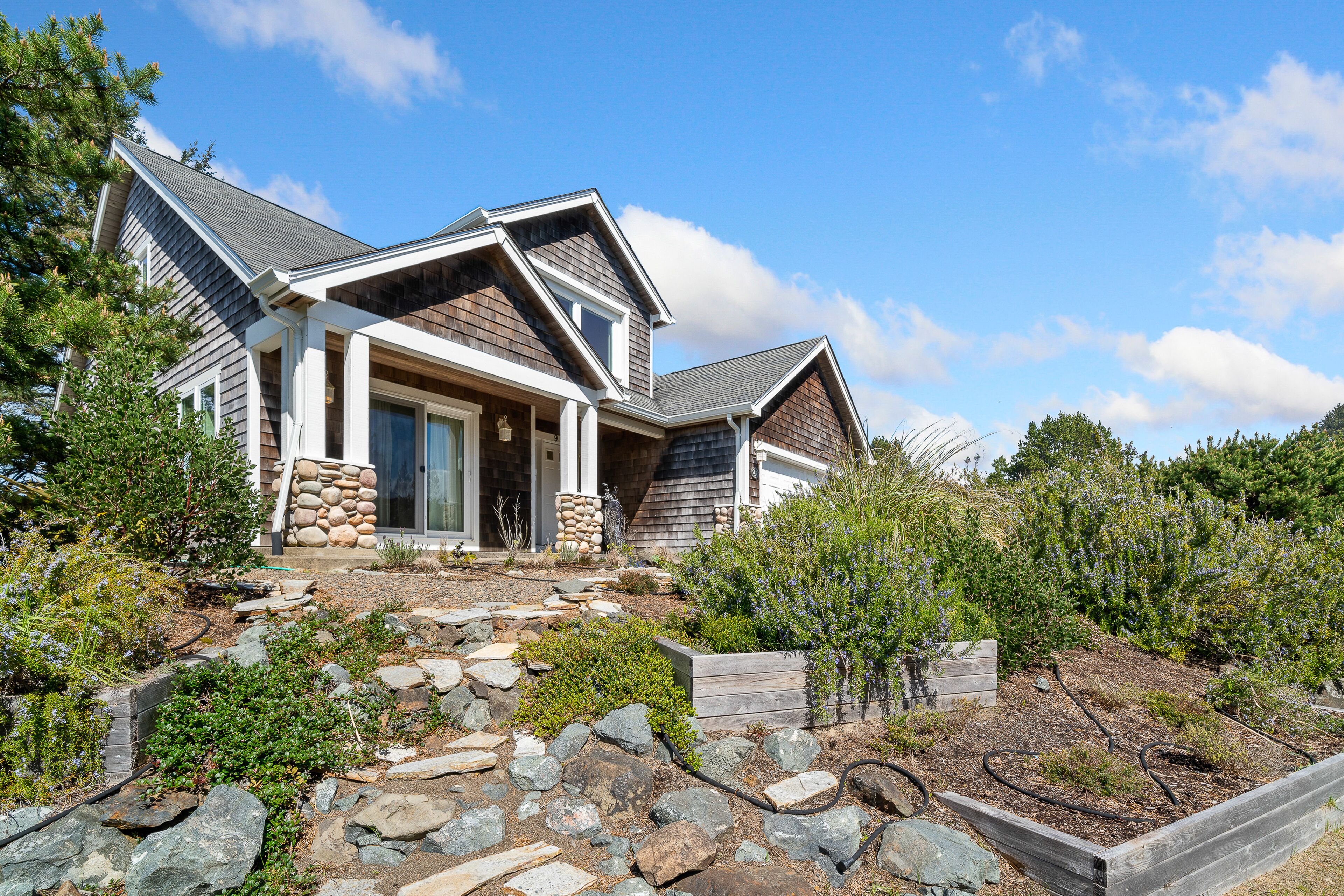 2-story golf course-front home with golf views, beach access and wood fireplace