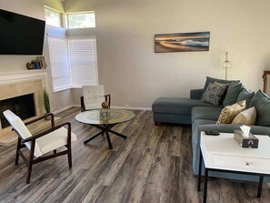 Smart TV, fireplace, books