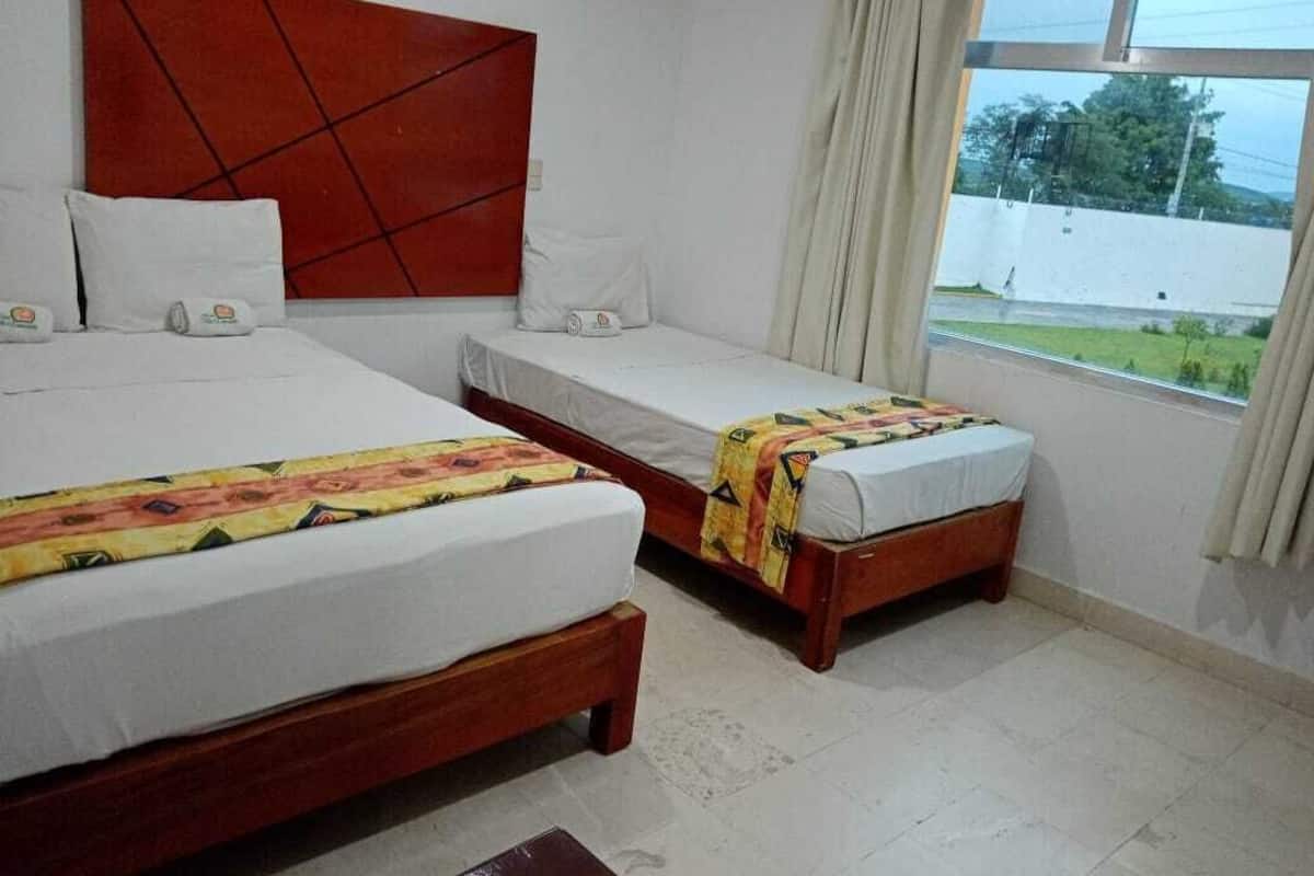 Down duvets, Tempur-Pedic beds, desk, laptop workspace