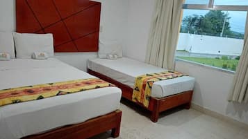 Down duvets, Tempur-Pedic beds, desk, laptop workspace