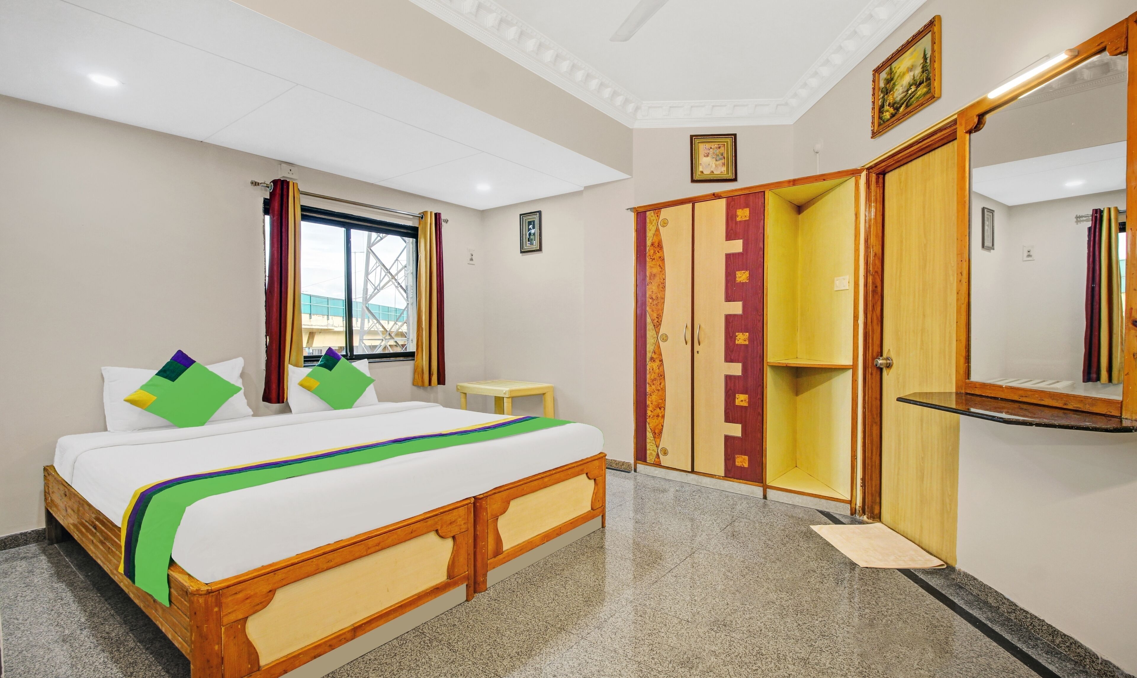 Desk, iron/ironing board, bed sheets