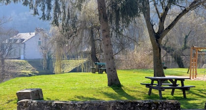 Character house in a romantic setting "At the water's'edge