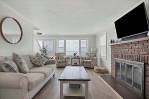 TV, fireplace - Duckling Crossing | Beach House on the Sand (Westbrook)