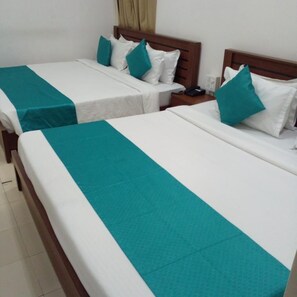 Habitación familiar | Sábanas de algodón egipcio y ropa de cama de alta calidad