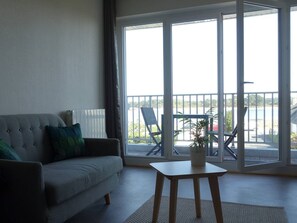 Living area - Sea View Apartment with Balcony, WIFI, and Parking in Trégastel (Trégastel)