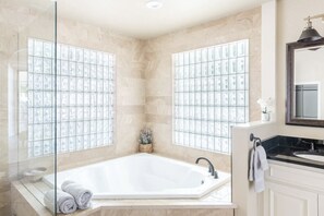 Hair dryer, towels, shampoo, toilet paper