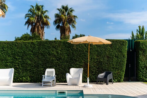 Maison de vacances "Maison tropicale" avec vue sur la mer, piscine privée et Wi-Fi.