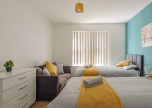 4 bedrooms, desk, iron/ironing board, travel crib