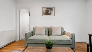 Apartment | Living area | 37-inch TV with cable channels, Netflix, streaming services