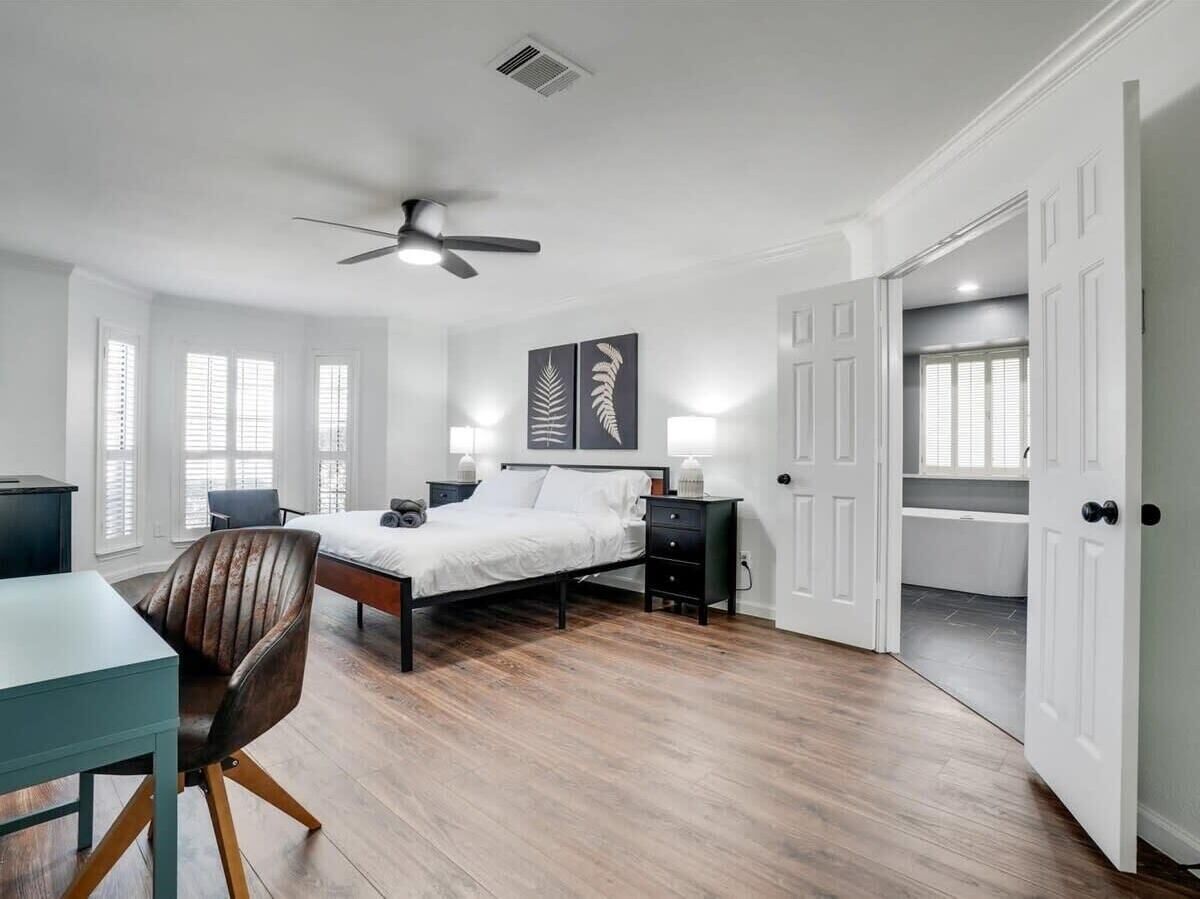 Bedroom 1: Looking for a quiet place to do some work? This bedroom includes a dedicated work station!