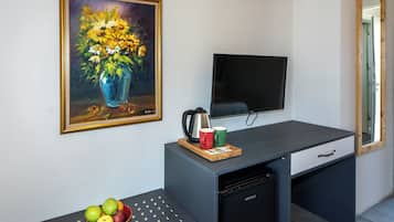 Quarto família | Roupas de cama premium, frigobar, cofres nos quartos