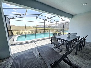 Outdoor dining - Aloha Oasis - Private Pool, 24/7 Support! (Davenport)