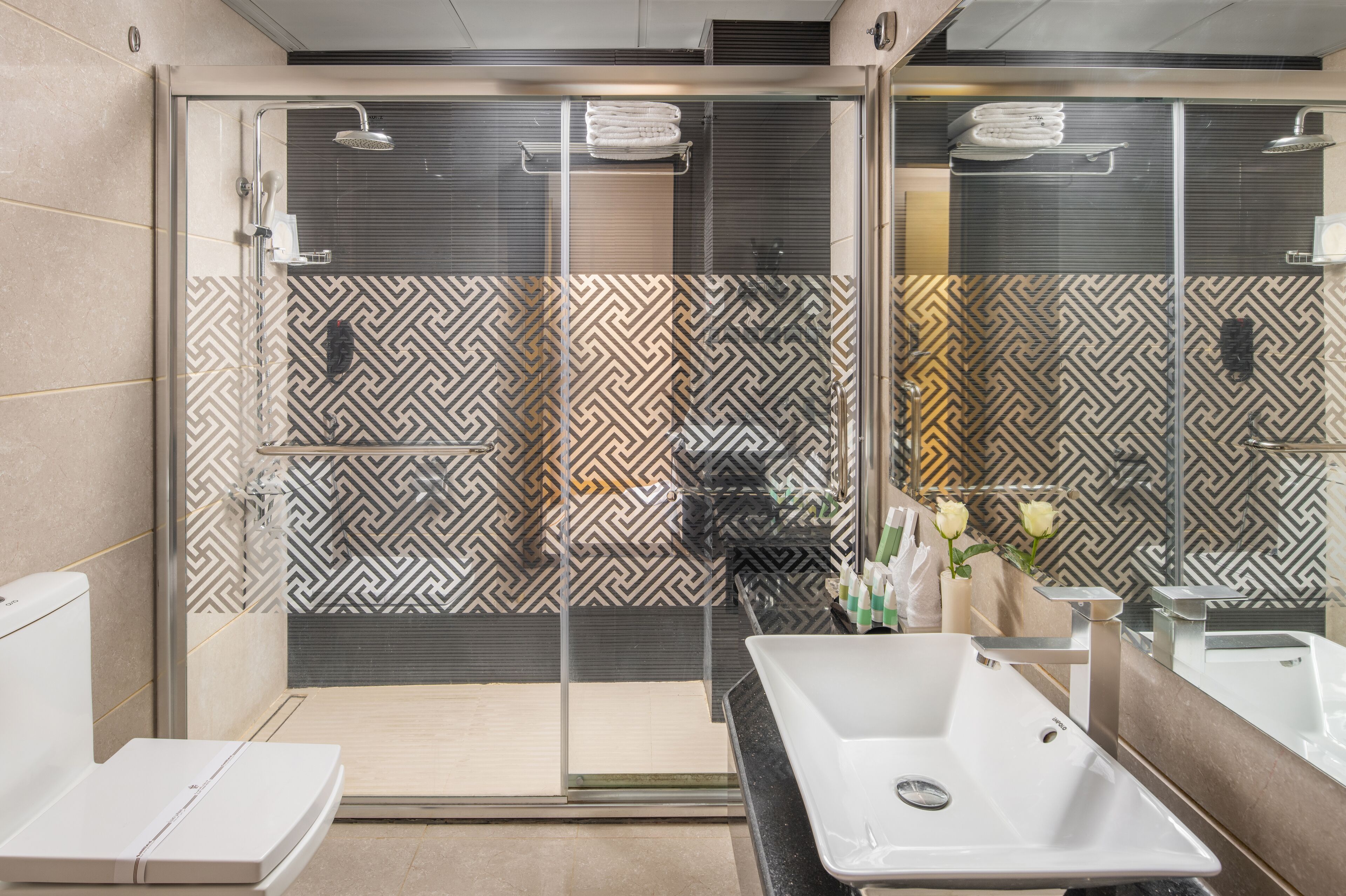 shower, free toiletries, hair dryer, towels