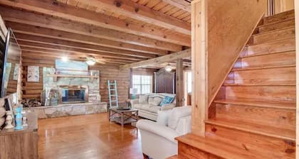 Unwind with the whole family at this serene 5-bedroom cabin retreat