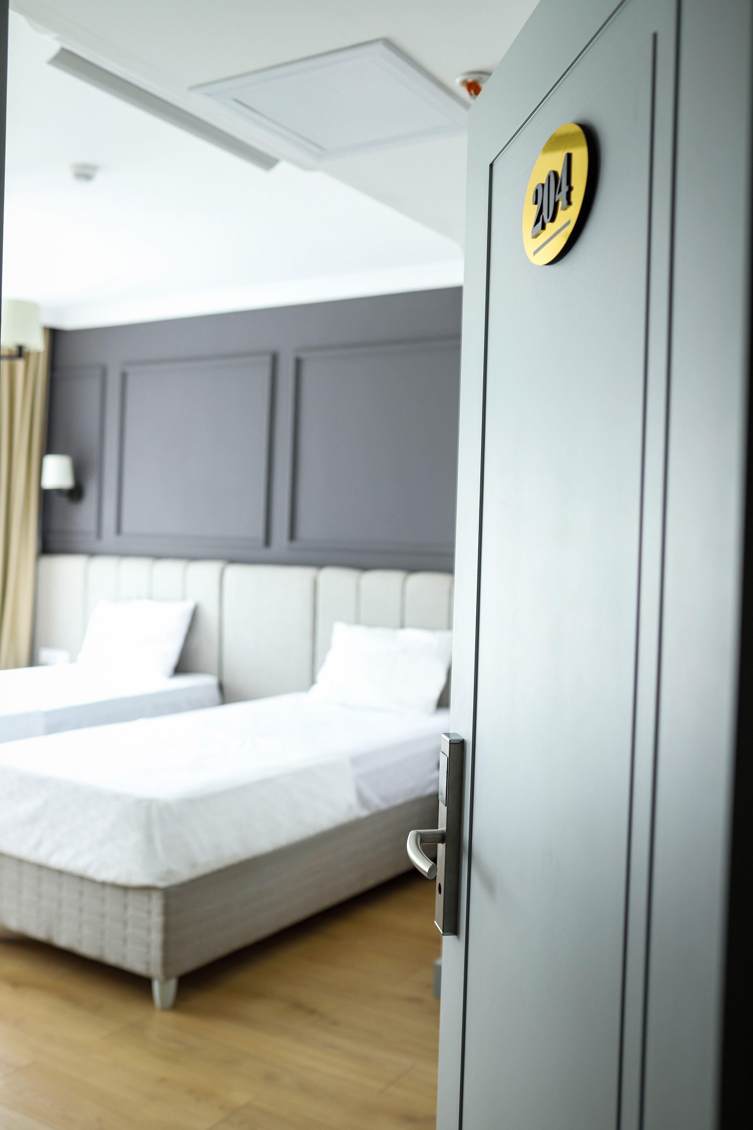 classic twin room | minibar, desk, laptop workspace, bed sheets