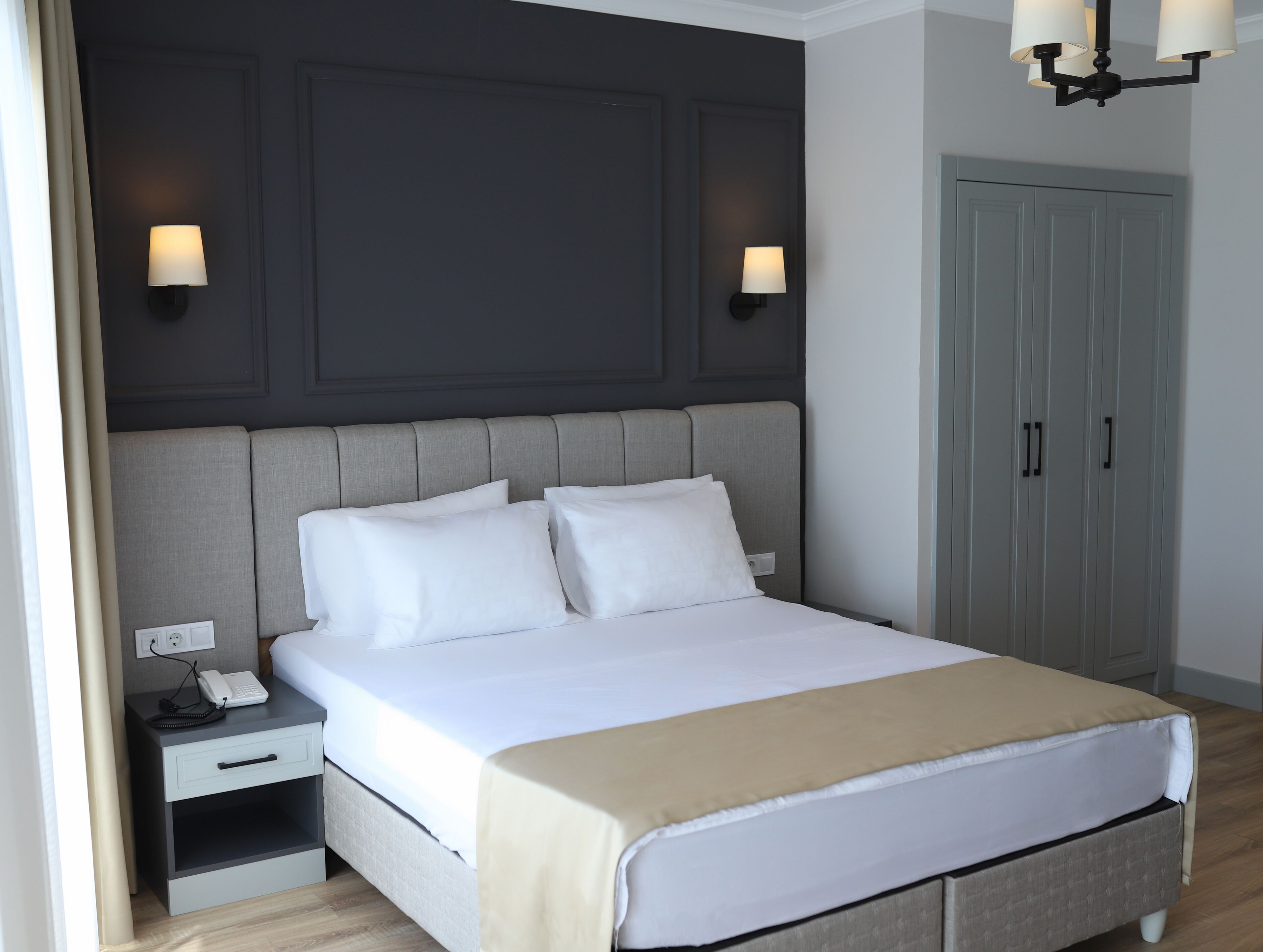 classic studio | minibar, desk, laptop workspace, bed sheets