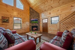 Een smart-tv, een open haard en videogames