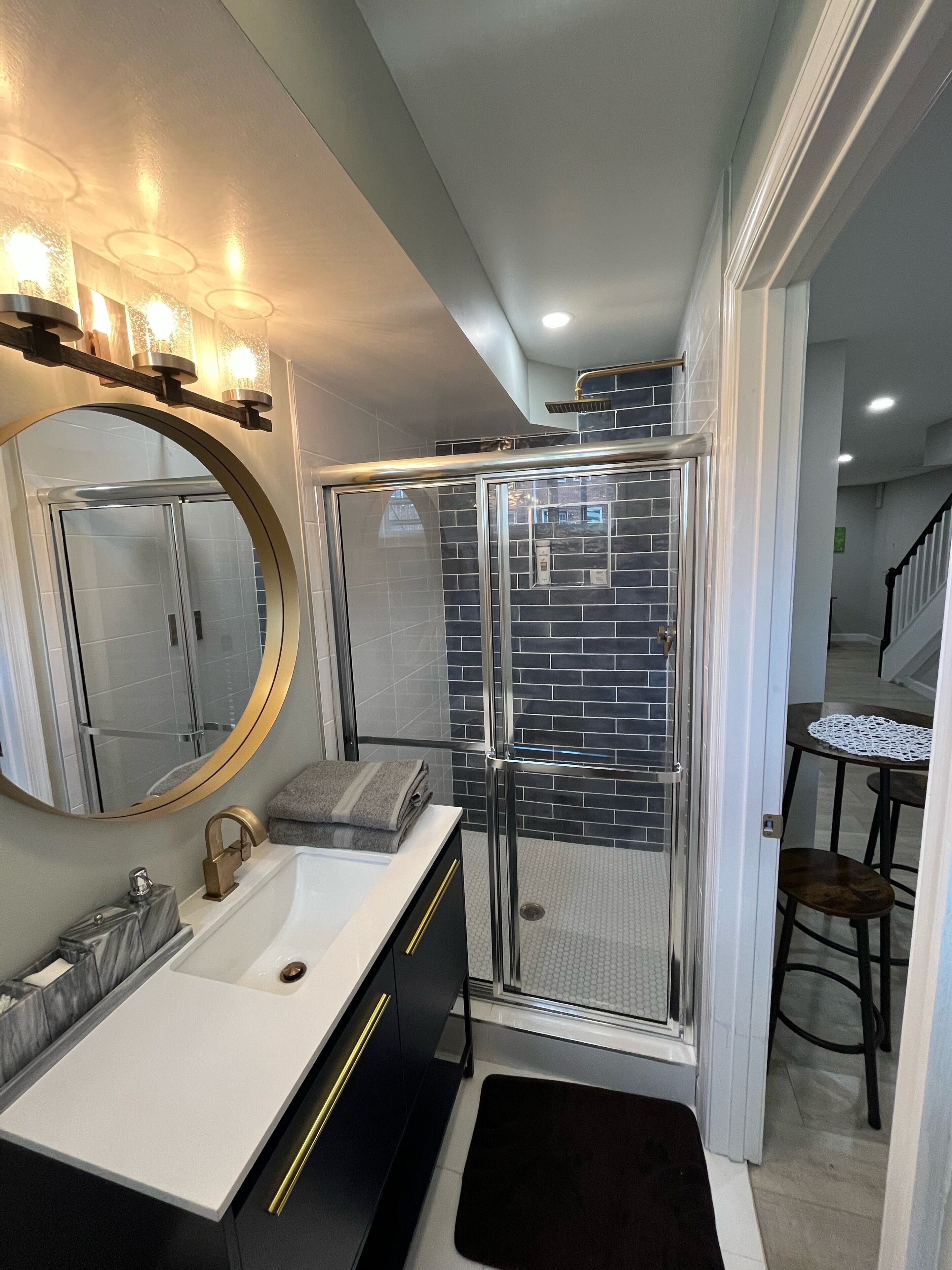 Shower, hair dryer, towels, soap