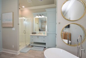 Combined shower/tub, hair dryer, towels, toilet paper